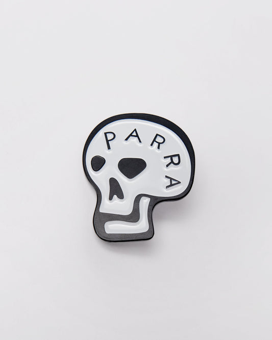 Skulled enamel pin